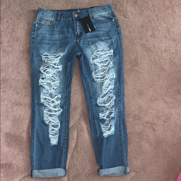 Fashion Nova Denim - “To The Bitter End Distressed Jeans” FASHIONNOVA